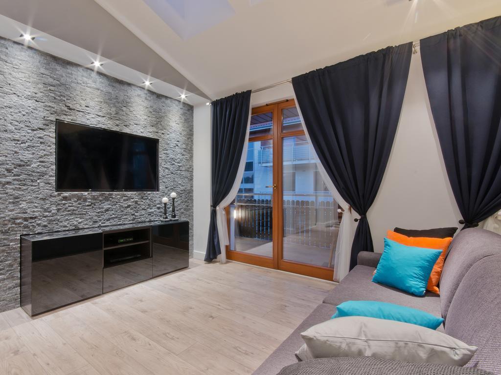 Strand Apartments กดัญสก์ ห้อง รูปภาพ